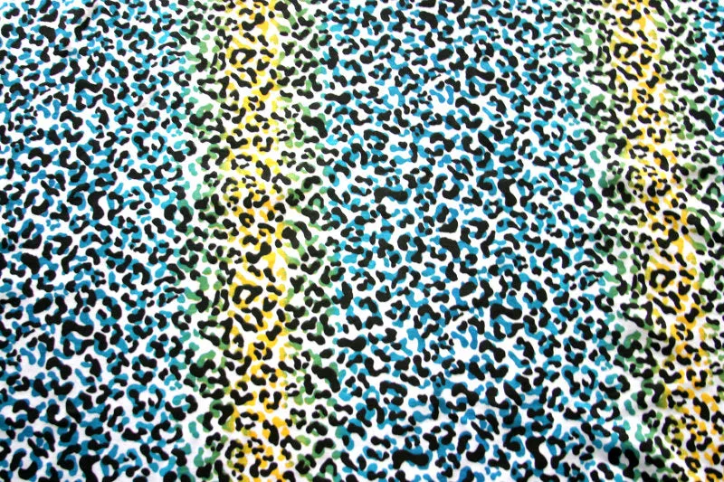 Blue, Green, and Yellow Vertical Leopard Stripe Knit Fabric