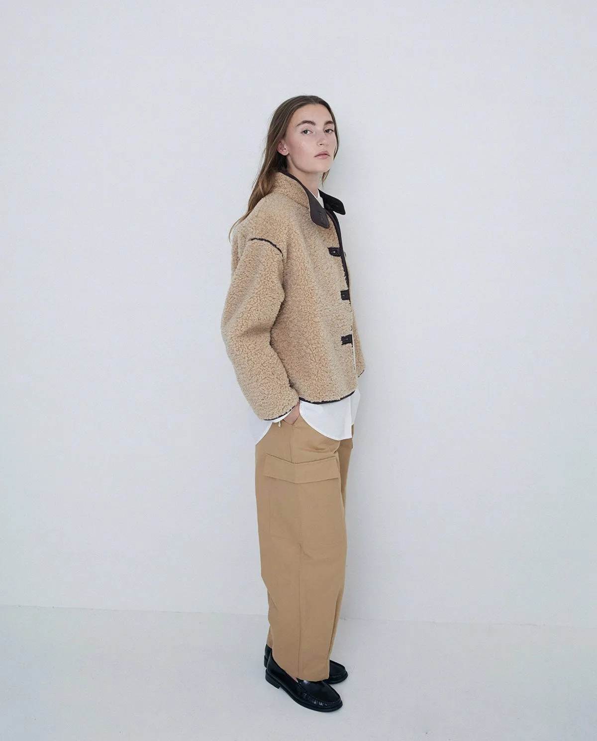 Giubbotto corto in shearling beige