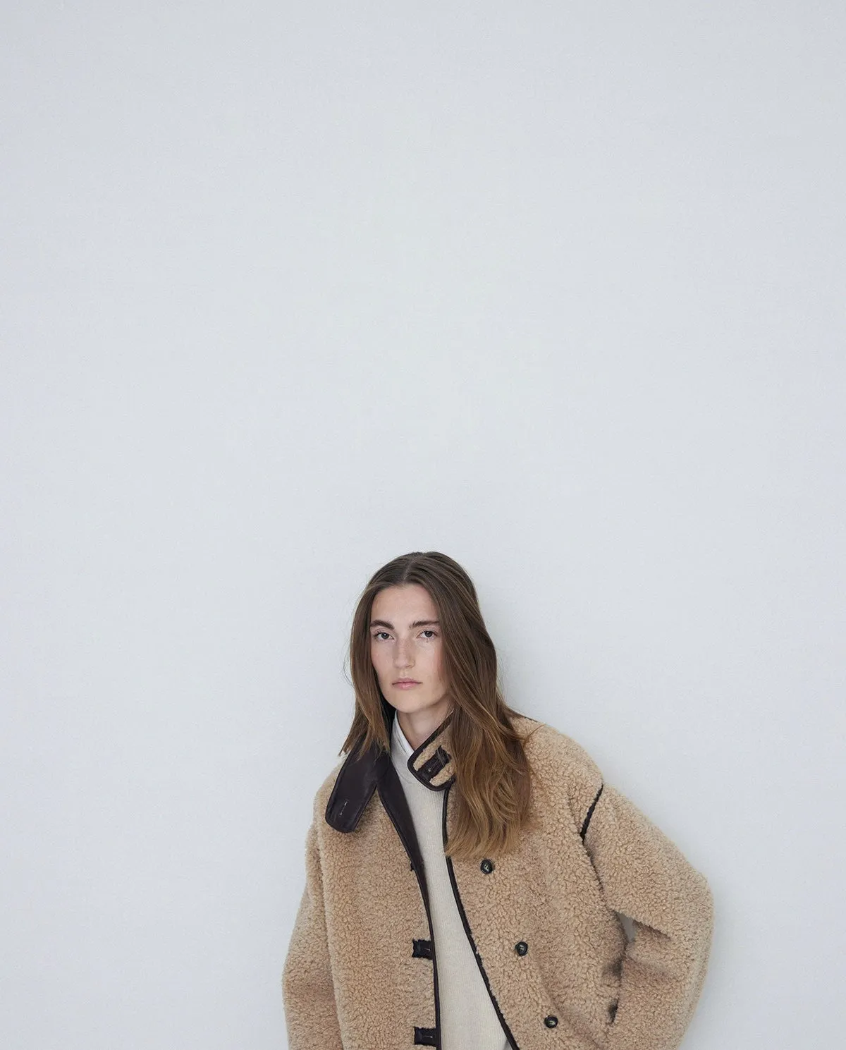 Giubbotto corto in shearling beige