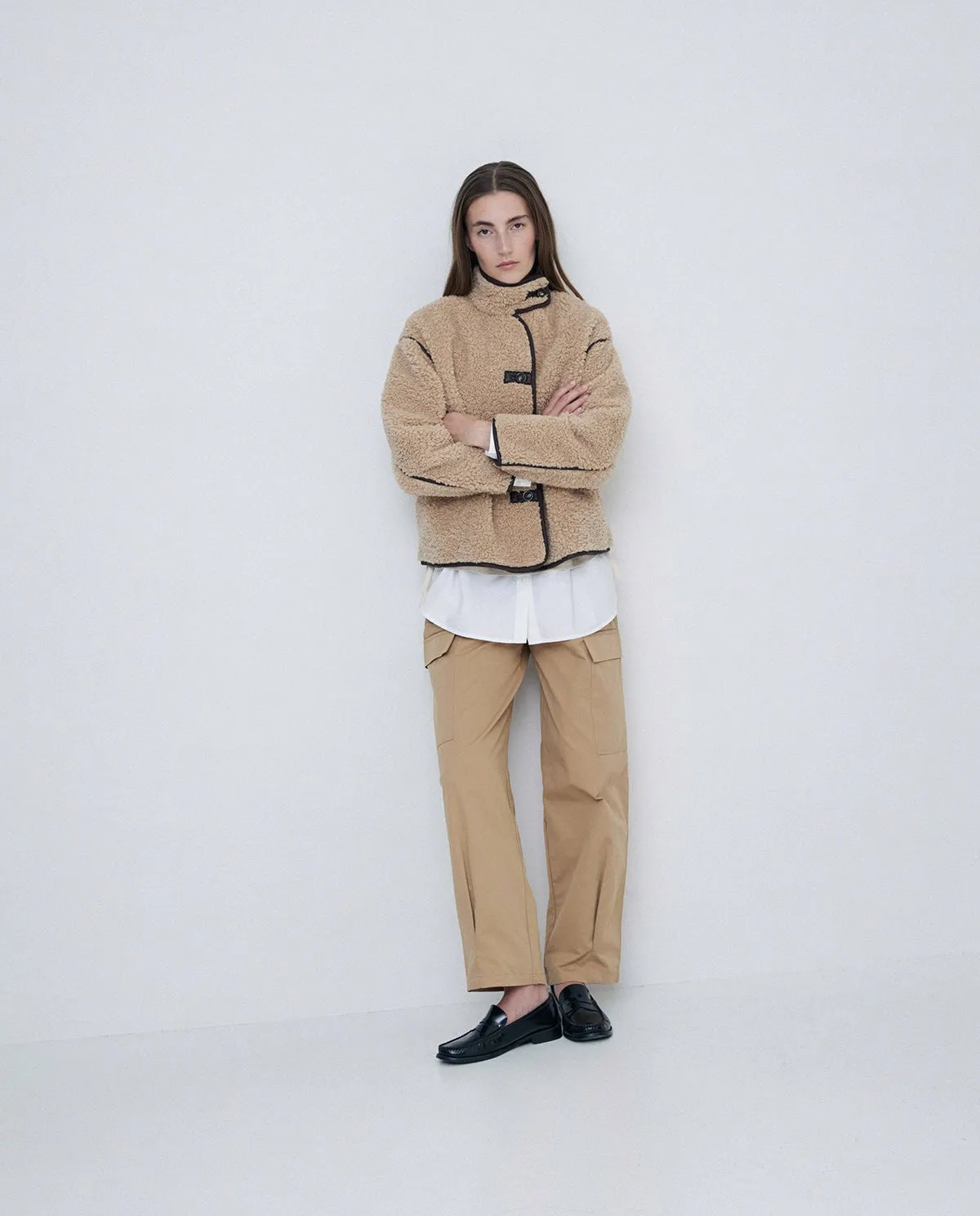 Giubbotto corto in shearling beige